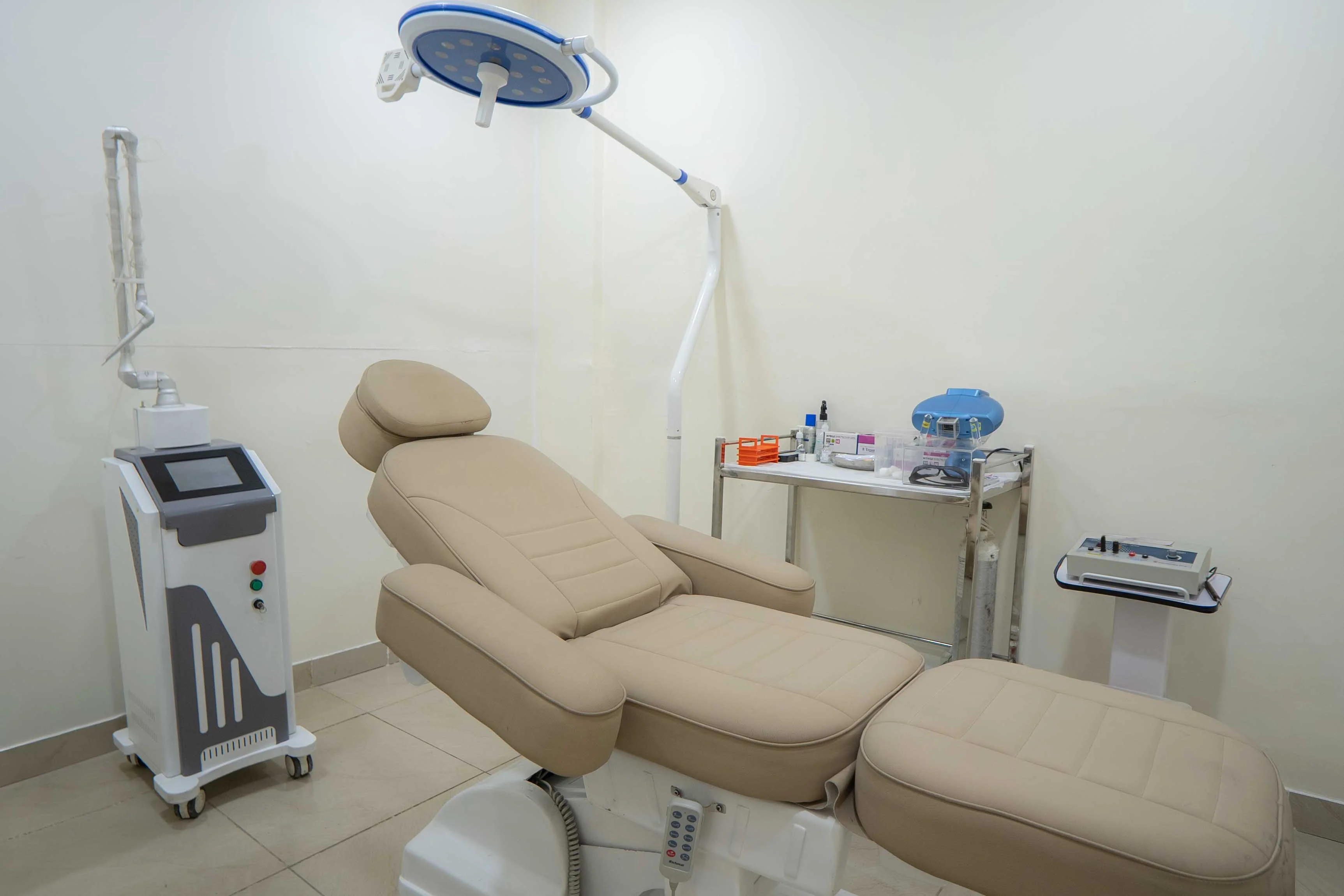Aesthetic treatment room with LED surgical light and laser equipment
